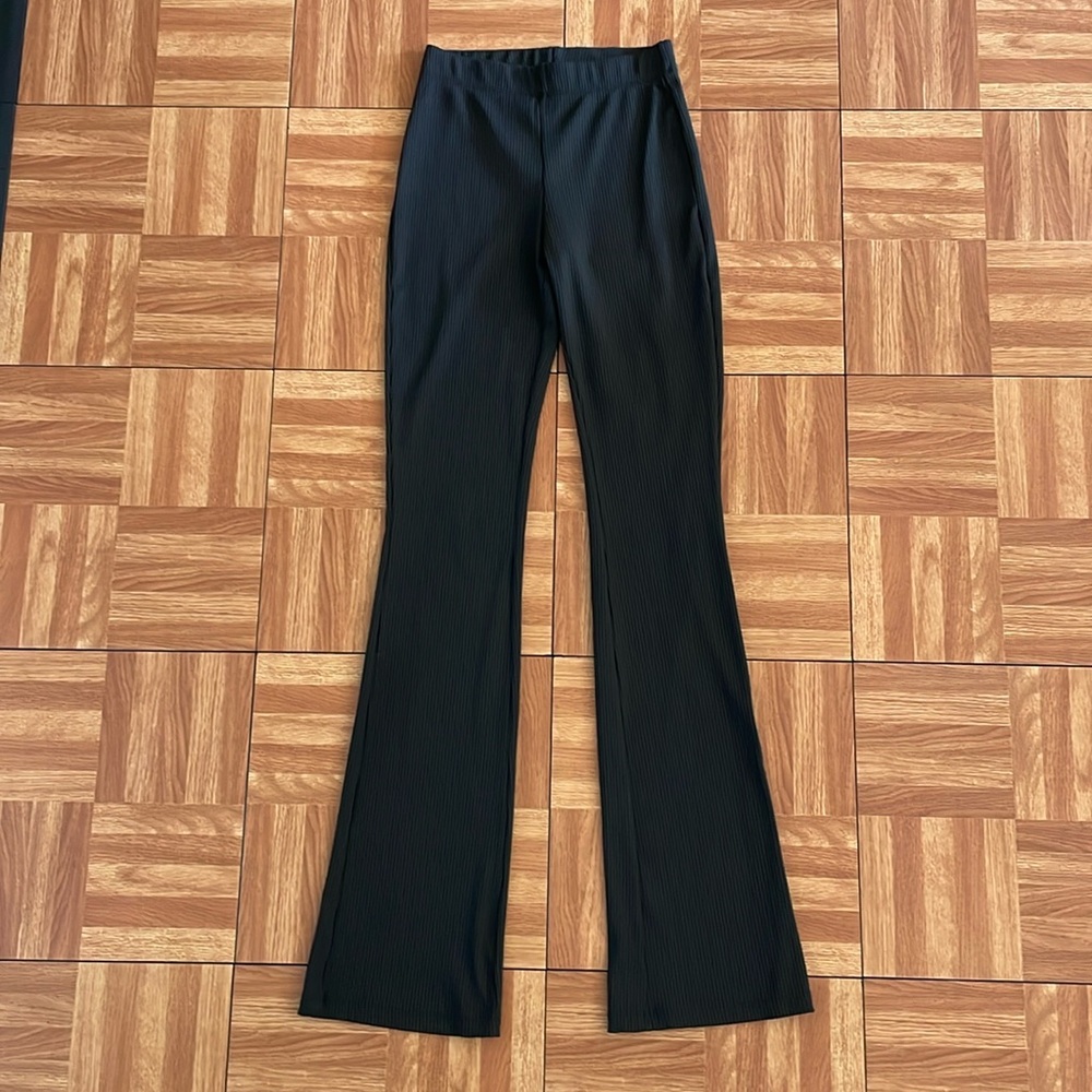 H&M black flare ribbed leggings. Worn only a couple of times.